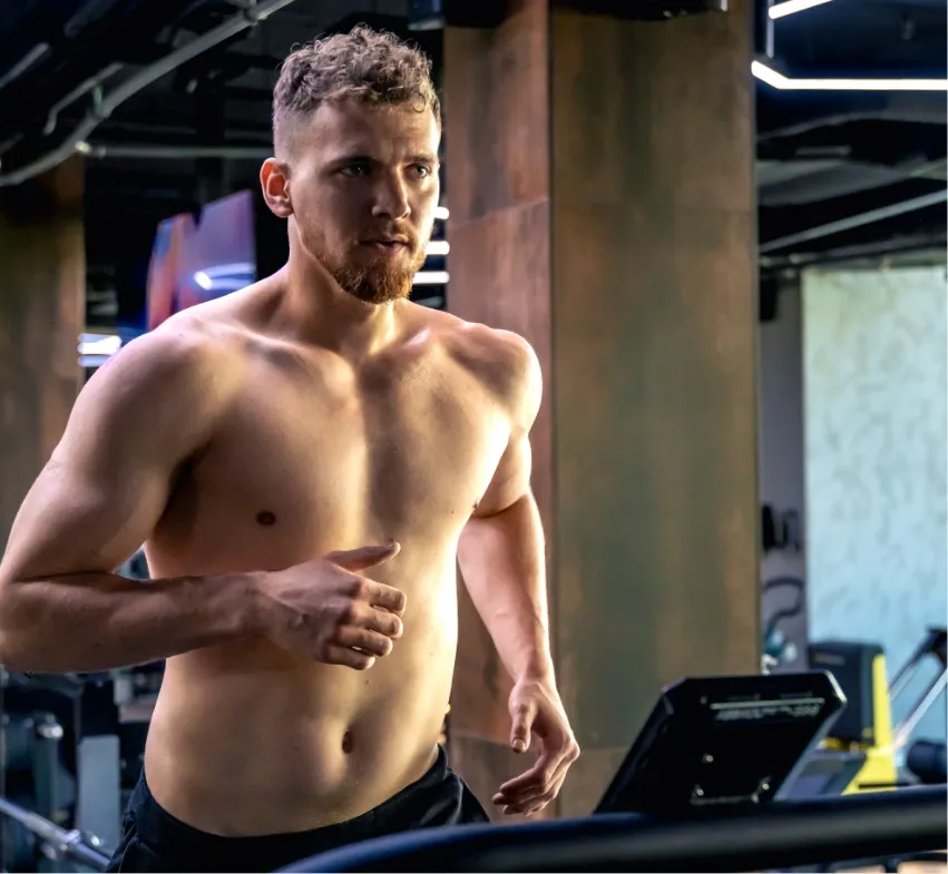athlete-on-a-treadmill-in-the-gym-shirtless-man-i-2024-09-26-23-17-44-utc (1)
