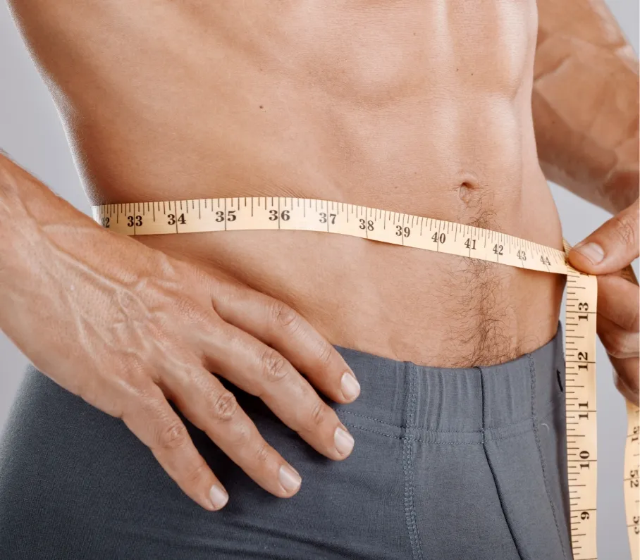 man-body-and-tape-measure-on-waist-in-studio-on-g-2023-11-27-05-37-09-utc
